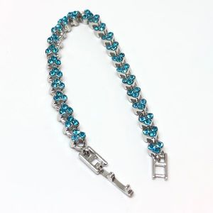 925/Platinum Layered London Blue Topaz CZ Tennis Bracelet